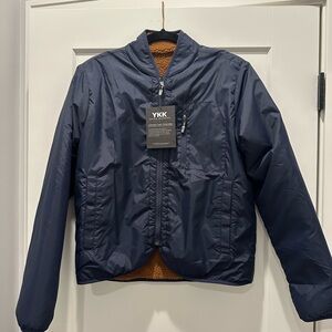 YKK Reversible Jacket 
Sherpa on one side and Navy on the other